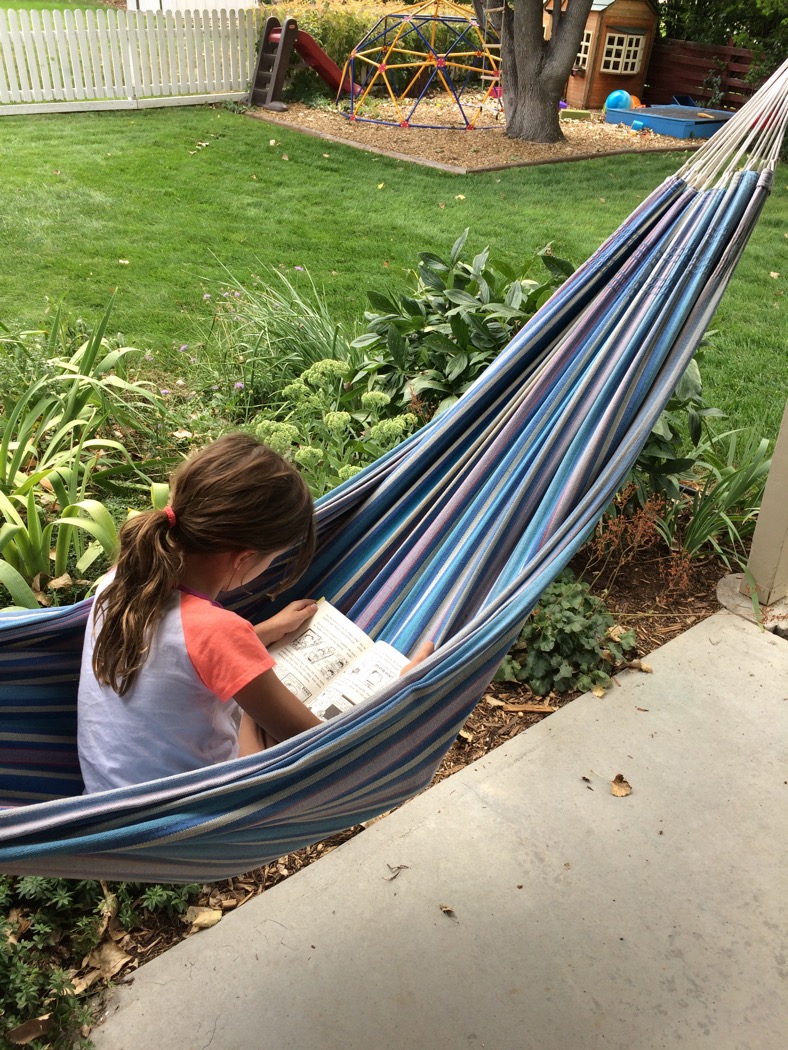 Afthead reading in a hammock